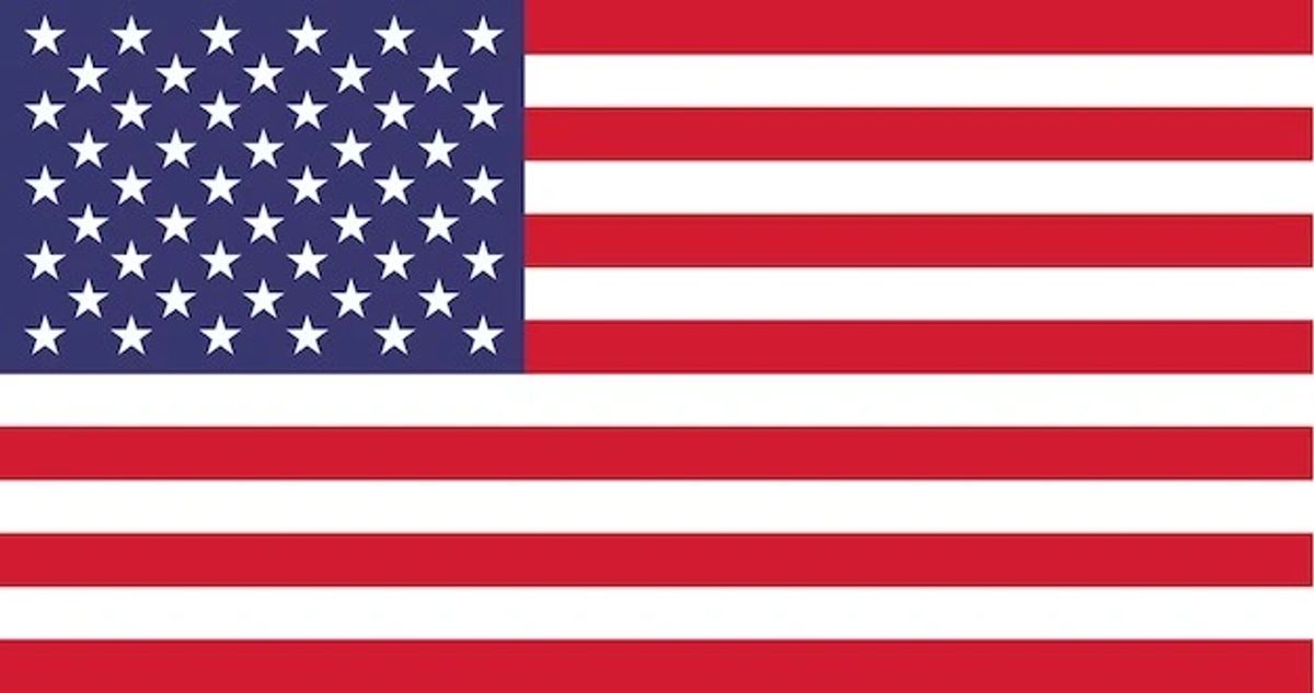 American flag flying against a blue sky
